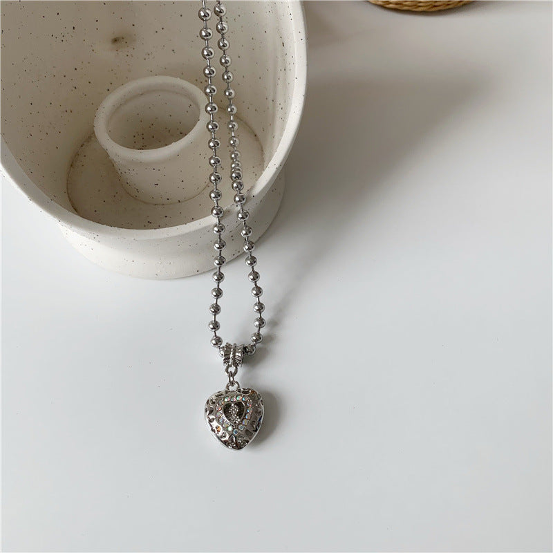 Wholesale Angel jelly love hollow diamond heart necklace titanium steel fashionable clavicle chain for women